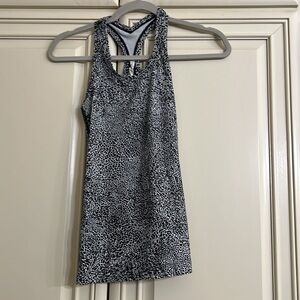 Lululemon black and white  Striped Swiftly Tech Racerback tank. Size 4